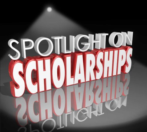 Stylized text displaying "SPOTLIGHT ON SCHOLARSHIPS" with dramatic lighting and reflections, emphasizing the importance of educational funding.